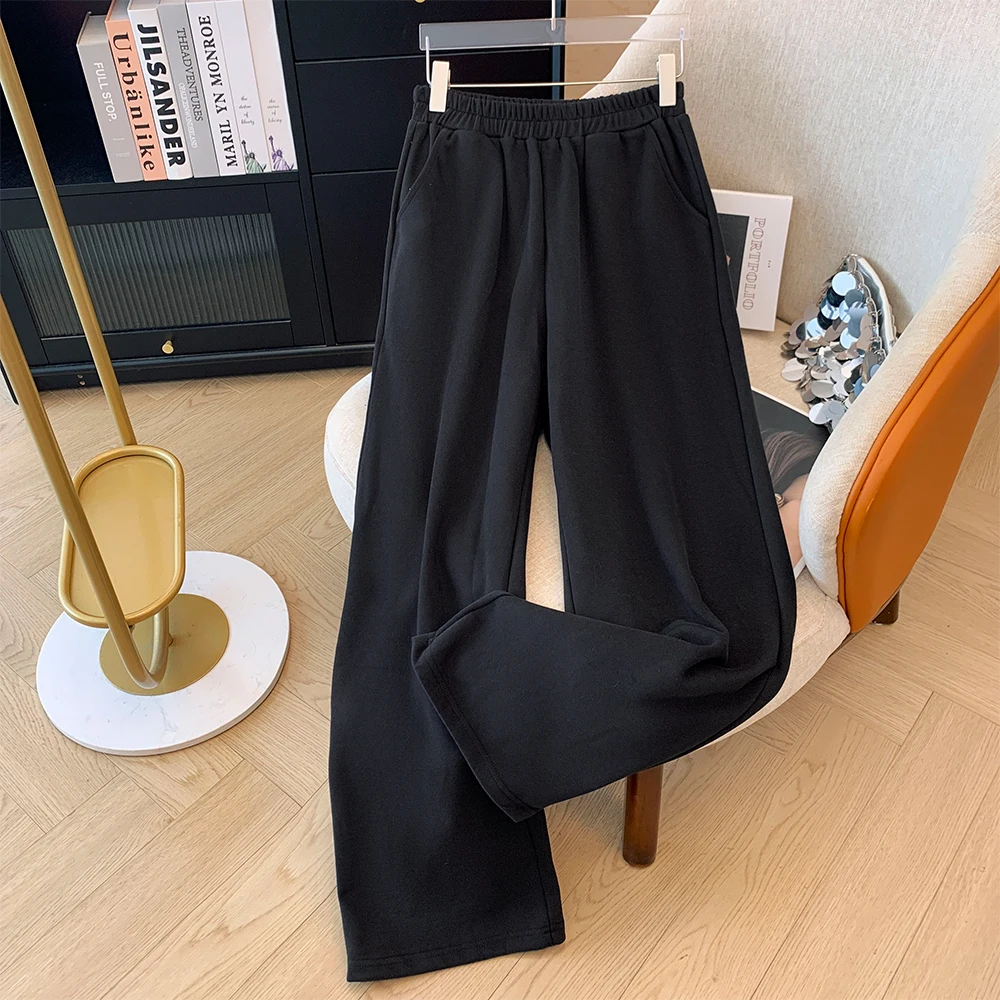 Plus-size women's fall casual commuter loose comfort pants Black simple elastic-waist straight leg pocket long pants large 2024