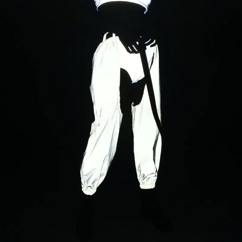 กางเกงสะท้อนแสงเซ็กซี่สำหรับผู้หญิง กางเกงจ็อกเกอร์เปิดเป้า กางเกงสะท้อนแสงโฮโลแกรม กางเกงเรืองแสงสำหรับใส่ไปคลับ แฟชั่นสตรีทแวร์