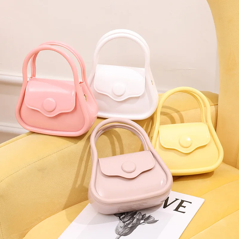 

Women's Cute Mini Jelly Handbag Pvc Top Handle Small Crossbody Bag with Button Closure for Casual & Party Wear