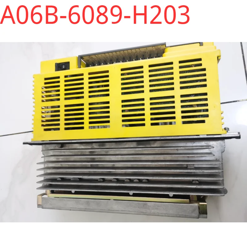 A06B-6089-H203 محرك سيرفو مستعمل تم اختباره جيدًا في حالة جيدة