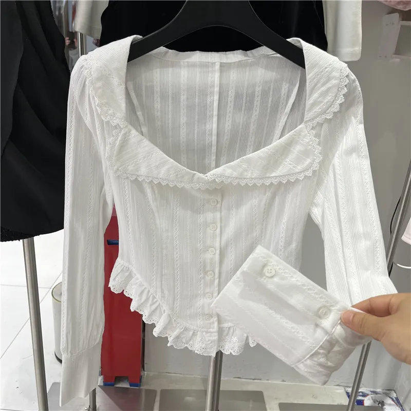 

Женская модная весенняя новинка: приталенная блузка с длинным рукавом, V-образным вырезом и кружевной отделкой, из полиэстера, в повседневном стиле.