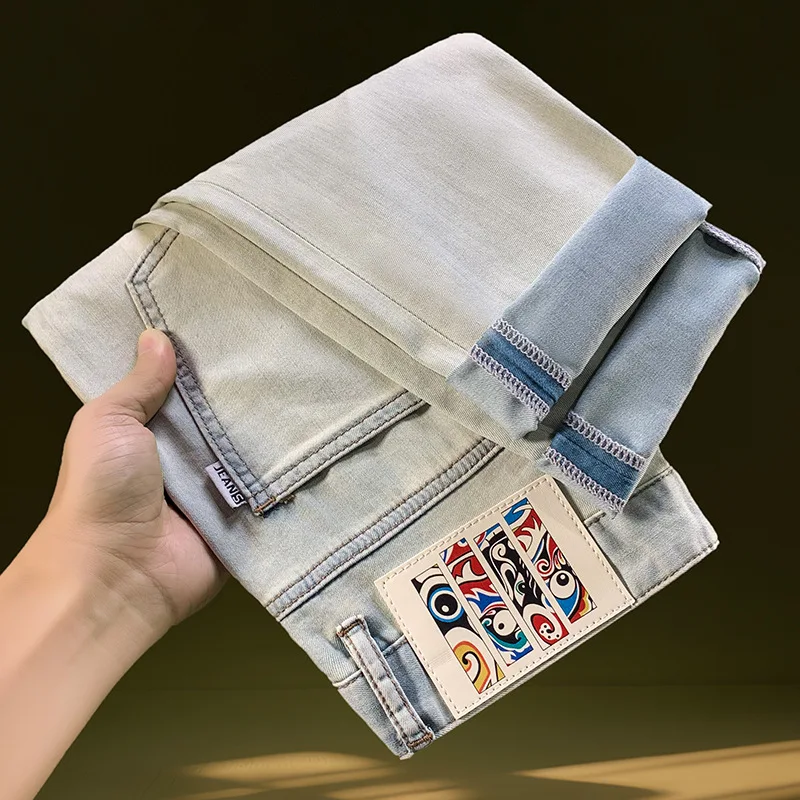 

2025 high-end casual men's jeans casual summer retro light color slim fit small foot elastic denim pants