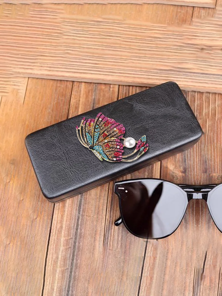 

Pressure-Proof Faux Leather Sunglasses Case for Women Eyewear Case Symmetry Decor, Crystal & Pearl Style