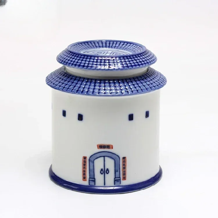 

Hand-painted blue and white porcelain tulou wailongwu tea jar commemorative gift