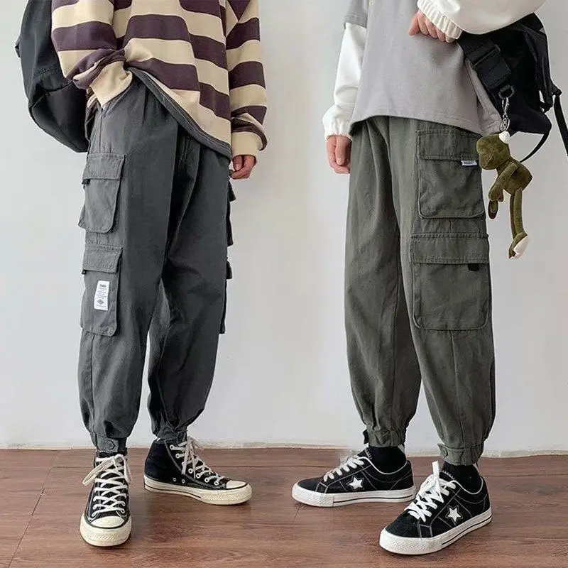 Frühling lose übergroße Herren bekleidung Trend koreanische Version lässige Mode gespleißt Tasche elastische Taille Kordel zug Cargo hose