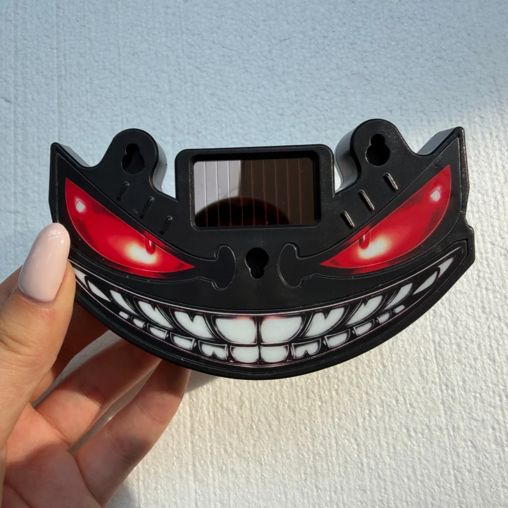 Featuring A Demon Face Design, The Solar Powered LED Decorative Light Is Easy And Convenient To install Using Suction Cups