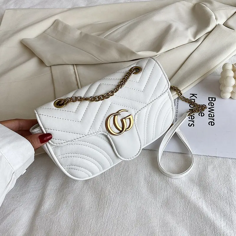 حقيبة كتف احترافية أنيقة للنساء أثناء السفر مع مادة من جلد الغزال ومقصورات متعددة وسطح ناعم ومريح