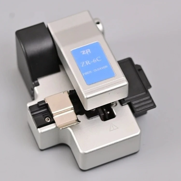

Fibra Optica Cutter Automatic Blade Rotationnd Scrap Collection One Step Precision Auto Return Fiber Cleaver Price