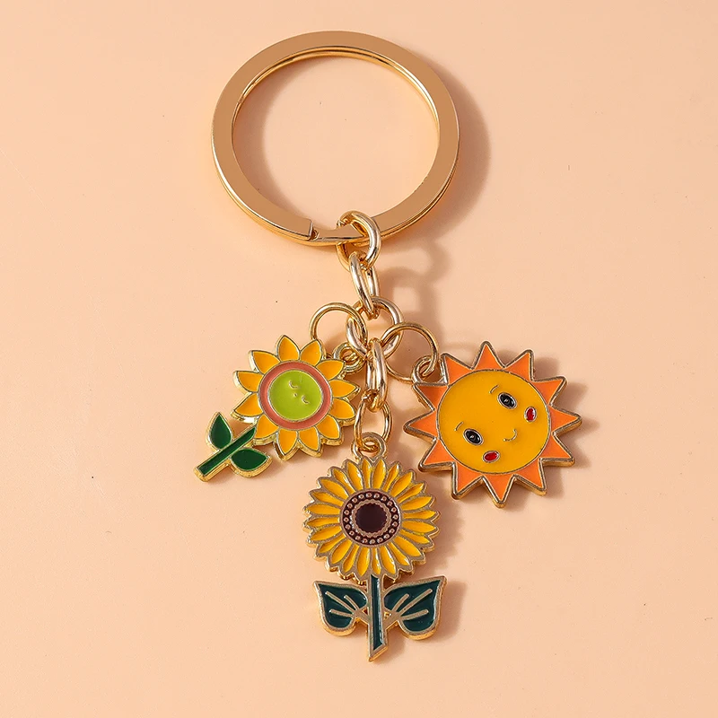 Bonito llavero de girasol esmaltado para mujer y niña, colgantes de anillo de Sol de dibujos animados, accesorios de bolso, regalo de joyería DIY