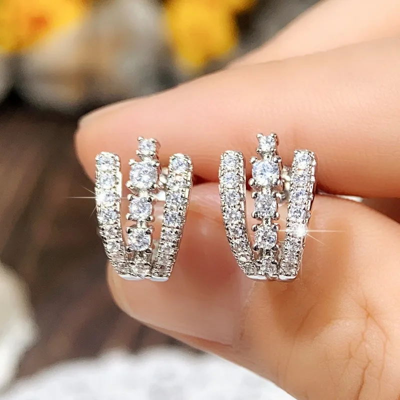 Huitan Chic Three Line Claw Stud Earrings with Sparkling White CZ Fashion Ear Piercing Accessories for Women Statement Jewelry