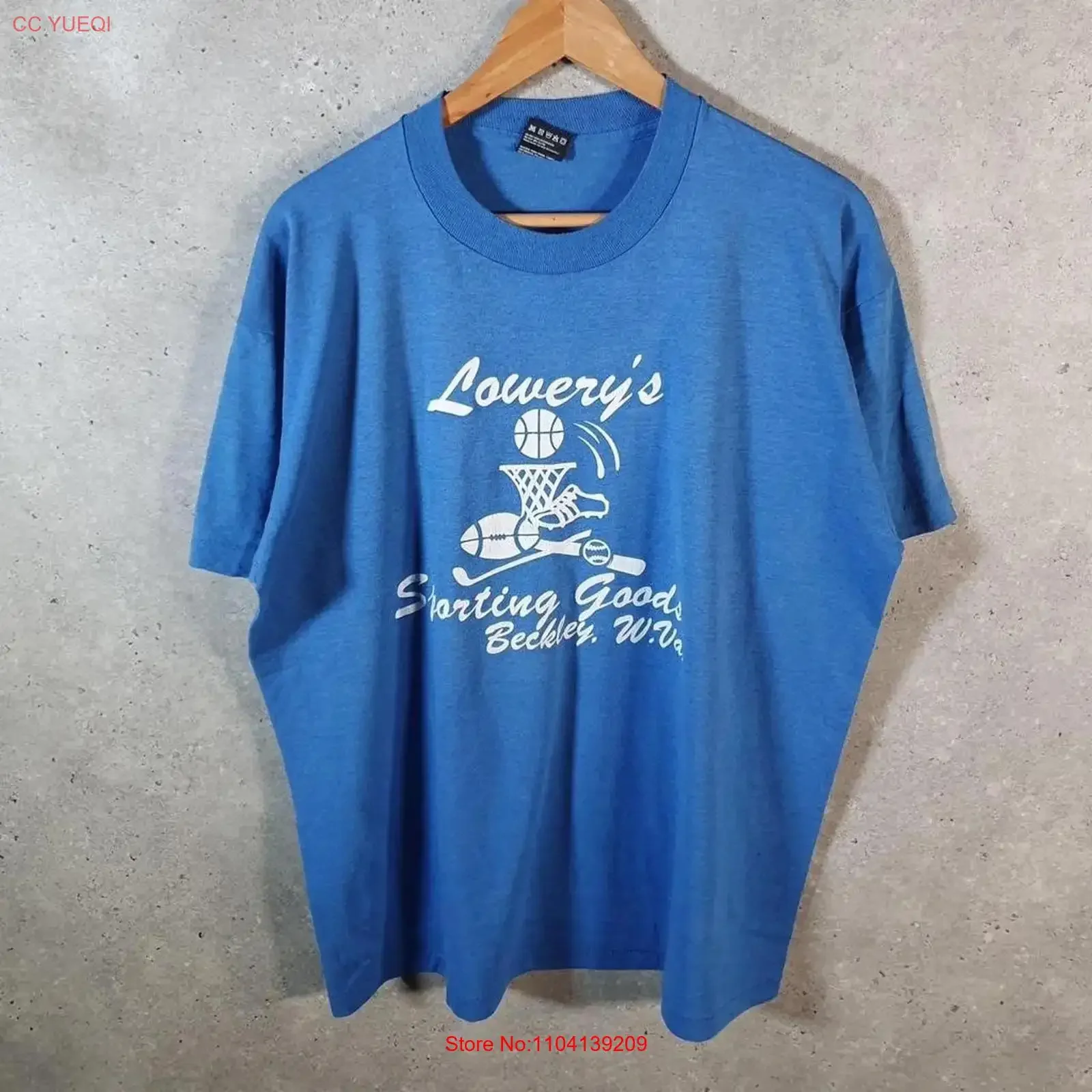 Vintage Fruit Of The Loom Lowerys Sporting Goods 90s USA T Shirt Mens XL Blue long or short sleeves vintage Washed Stretched