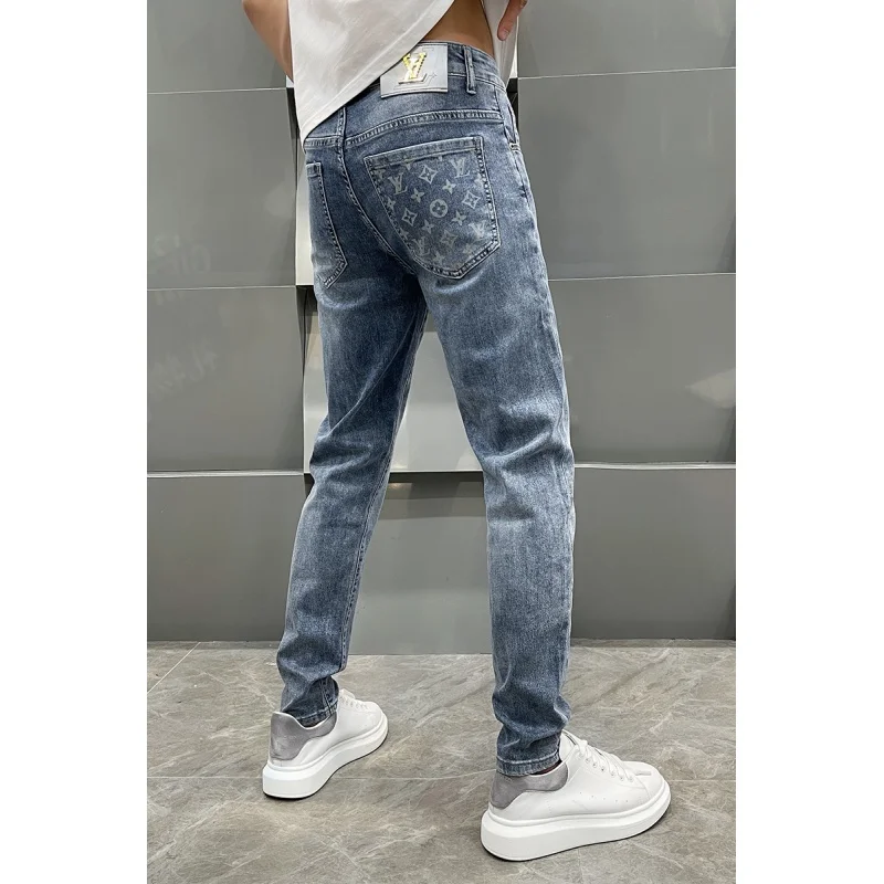 High-end light luxury printing men\'s jeans loose straight pants spring and summer models casual versatile light blue men\'s pants