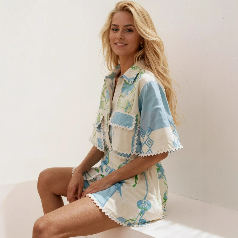 مجموعة أزياء جديدة عصرية متعددة الاستخدامات من الدانتيل المطبوع بأكمام قصيرة لربيع وصيف 2026 على الطراز الأوروبي الأمريكي ملابس نسائية