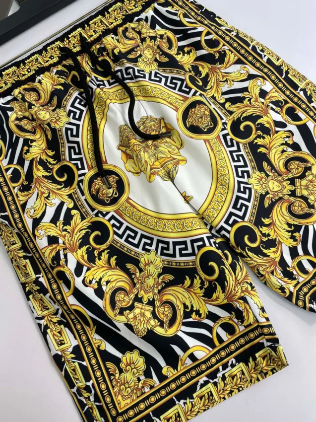 Beach pants men\'s summer ins casual loose shorts cropped pants men\'s plus size trend gold high-end print comfortable and loose