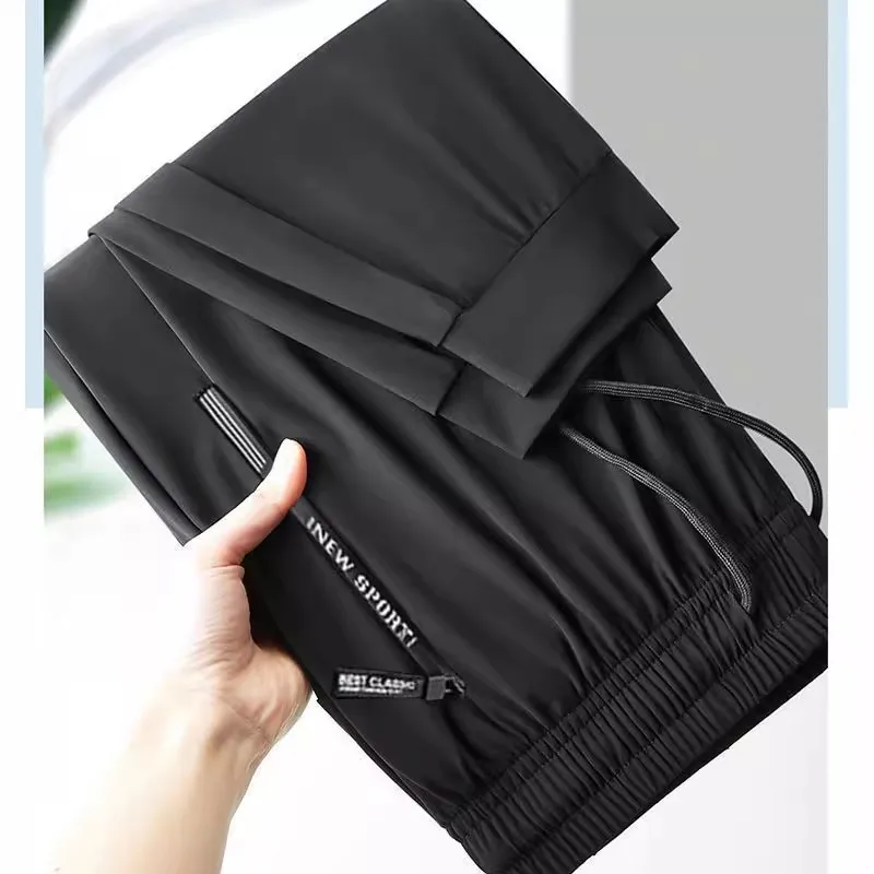 ใหม่ 2025 ชายผ้าไหมน้ําแข็ง Cool Feeling หลวมสบายๆกางเกงยาวกางเกงทํางานบางพร้อมซิป Kets สําหรับทํางาน