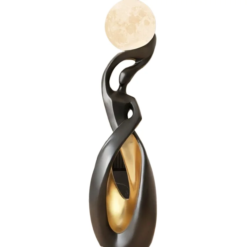 Designer of the floor-standing sculpture lamp featuring modern minimalist art decoration with standing and glowing diodes.