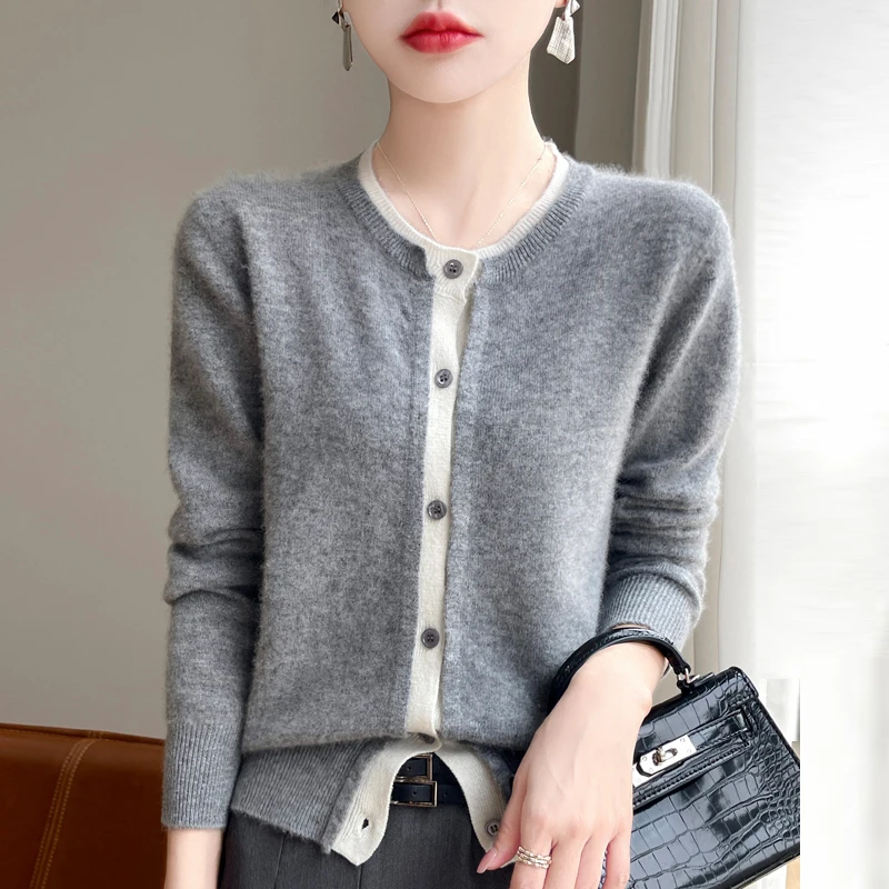 Autumn and winter new 100% pure sweater women's O-neck cardigan fake two loose casual contrast long-sleeved coat.