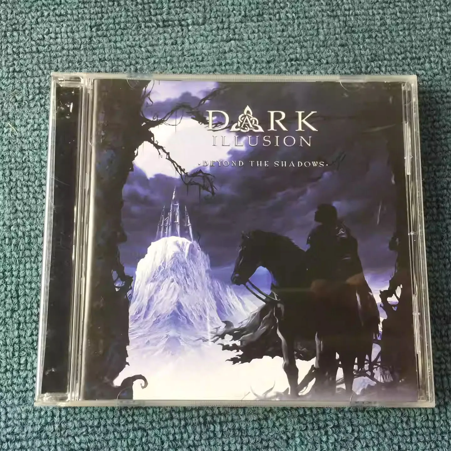 

CD 'dark Illusion Beyond The Shadows ' Is The Debut Full-length Studio Album By Swedish Heavy/power Metal Band Dark Illusion