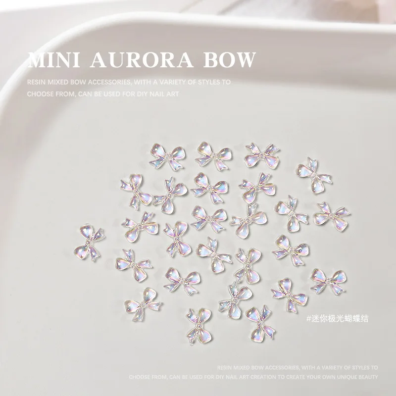 100 Uds Mini Aurora pajarita transparente 3d acrílico Nail Art Charms accesorios con lazo para manicura suministros de decoración de uñas