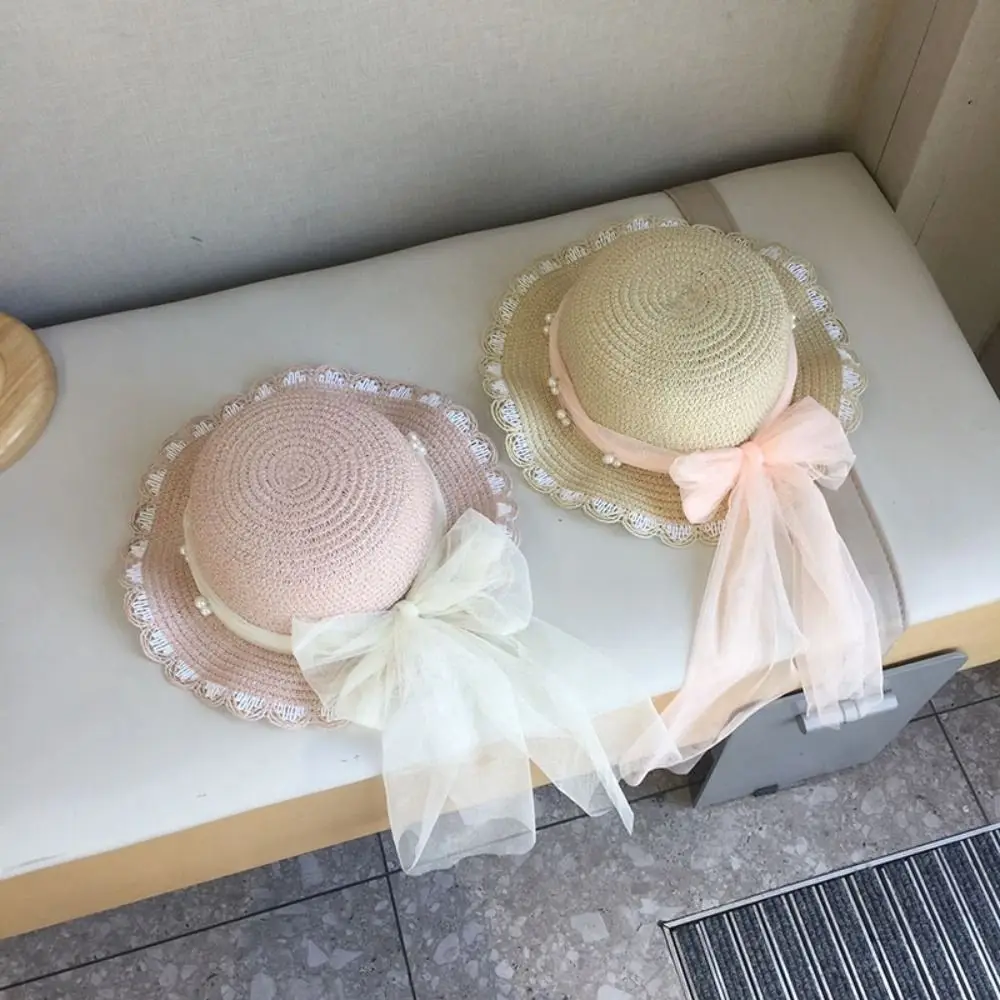 جديد القش الأطفال القبعات القش واسعة حافة تنفس واقية من الشمس قبعة أزياء عارضة القوس الشمس كتلة قبعة الصيف