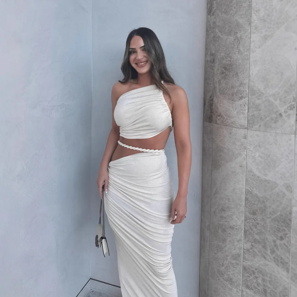 

Beach vacation wind 2025 spring and summer sexy backless slanted shoulders hip-wrapped pleated dress