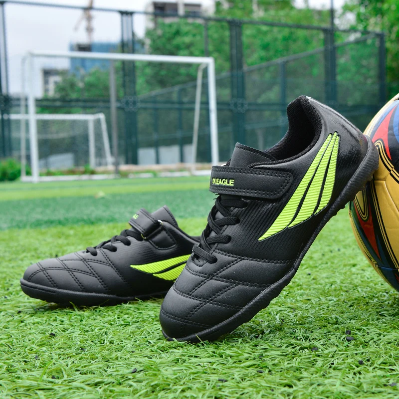 

A pair of children's hook and loop soccer cleats non slip training turf shoes lightweight outdoor football sneakers ZS-DR11