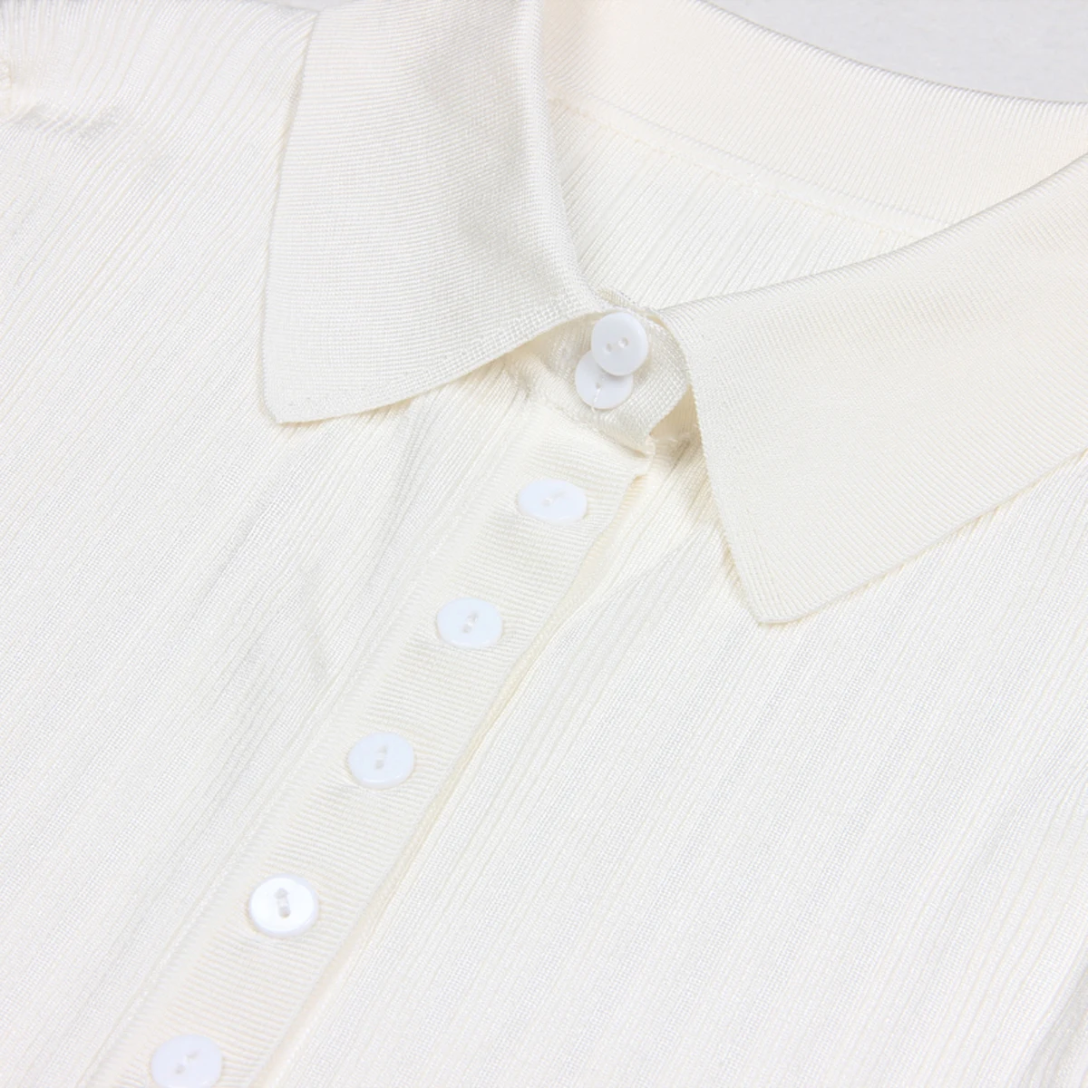 Primavera y otoño nuevo estilo moda temperamento viajero alta calidad hielo seda tejido manga larga cuello cárdigan Top Coat