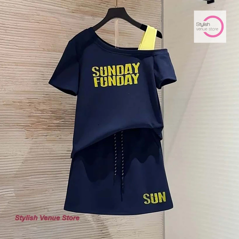 

Summer new temperament letter design two-piece women's French loose slim cover meat fashion design sense of luxury leisure suit.