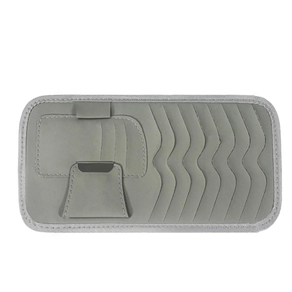 Leather car CD holders and visor clips combined with a CD storage bag to organize CDs on sun visors in a wide range of vehicles