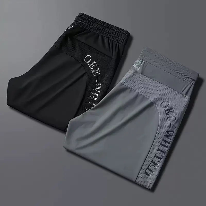 

Men's Summer Thin Ice Silk Sports Loose Casual Pants Qui Dry Large Size Cuffed Trousers Polyester Fiber Straight Leg Pants