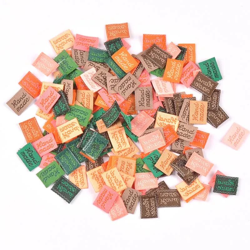 100Pcs/bag Embroidered Cloth Labels DIY Garment Bags For Garment Embossed Flag Sewing Tags Handmade Accessories 11x15mm C2393