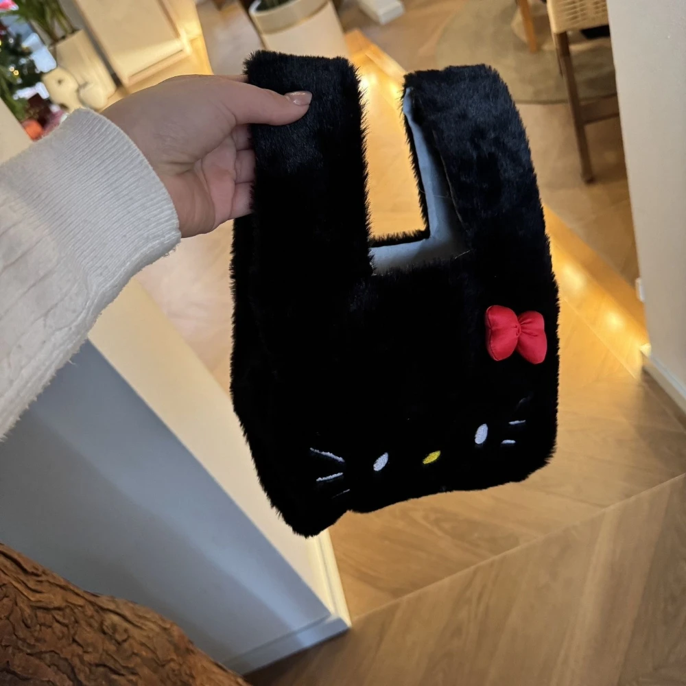 

New Hello Kitty Women's Shoulder handbag Cute Cat Mini handbag plush Women's shoulder handbag Mini Kawaii Small Shoulder Bag