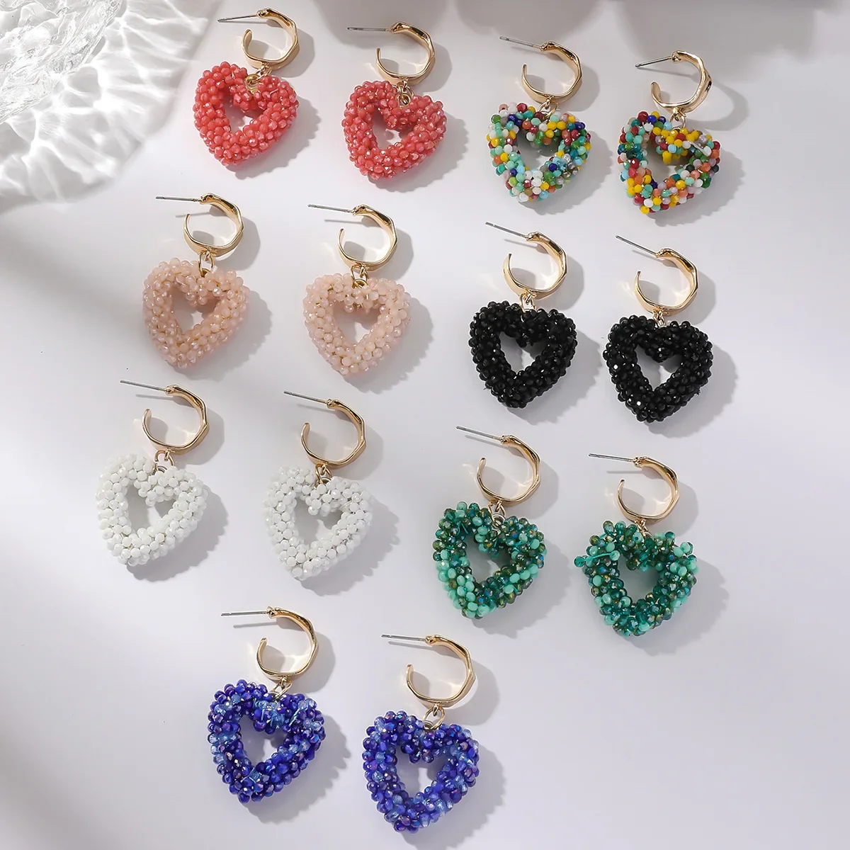 

2025 Handmade Beaded Earrings Heart Hollow Out Originality Bohemia Crystal Entangle Hand Knitting Fashion Female