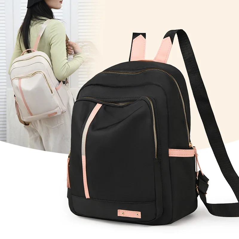 

Women's backpack, large capacity, adjustable shoulder straps, zipper closure, casual university style, school backpack