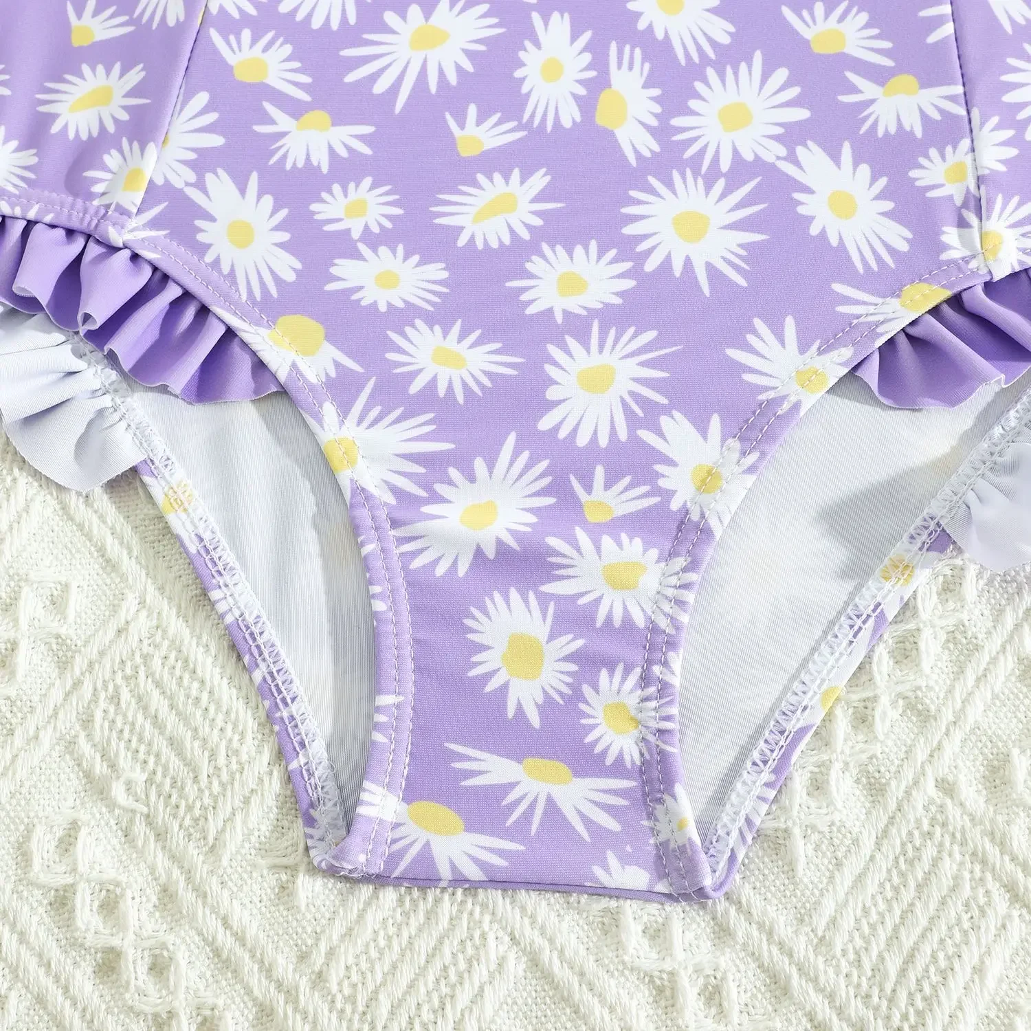 Nuevo traje de baño de una pieza para niñas de verano 2025, traje de baño sin mangas de secado rápido con estampado de flores de dibujos animados, traje de baño para bebés