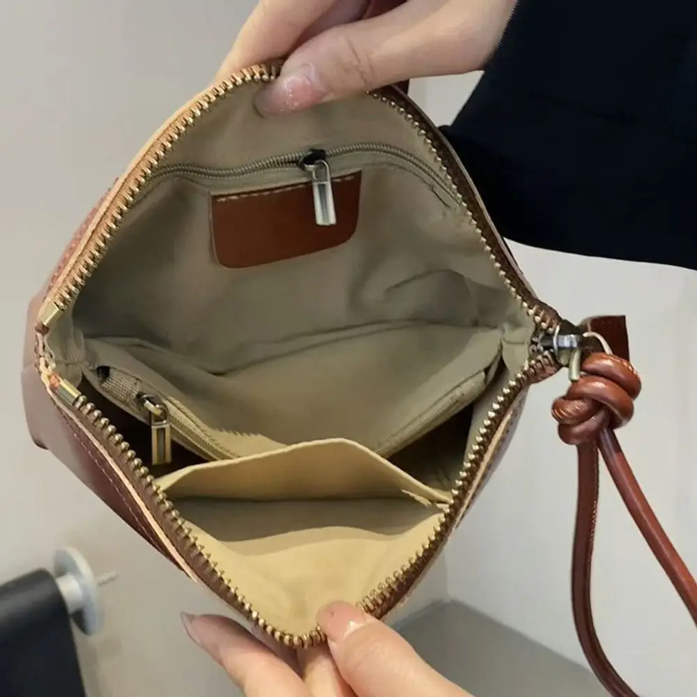 Large Capacity Vegetable Tanned Leather Handbag Light Luxury Lightweight Shell Clutch Bag Simple Design Wrist Coin Purse view 5