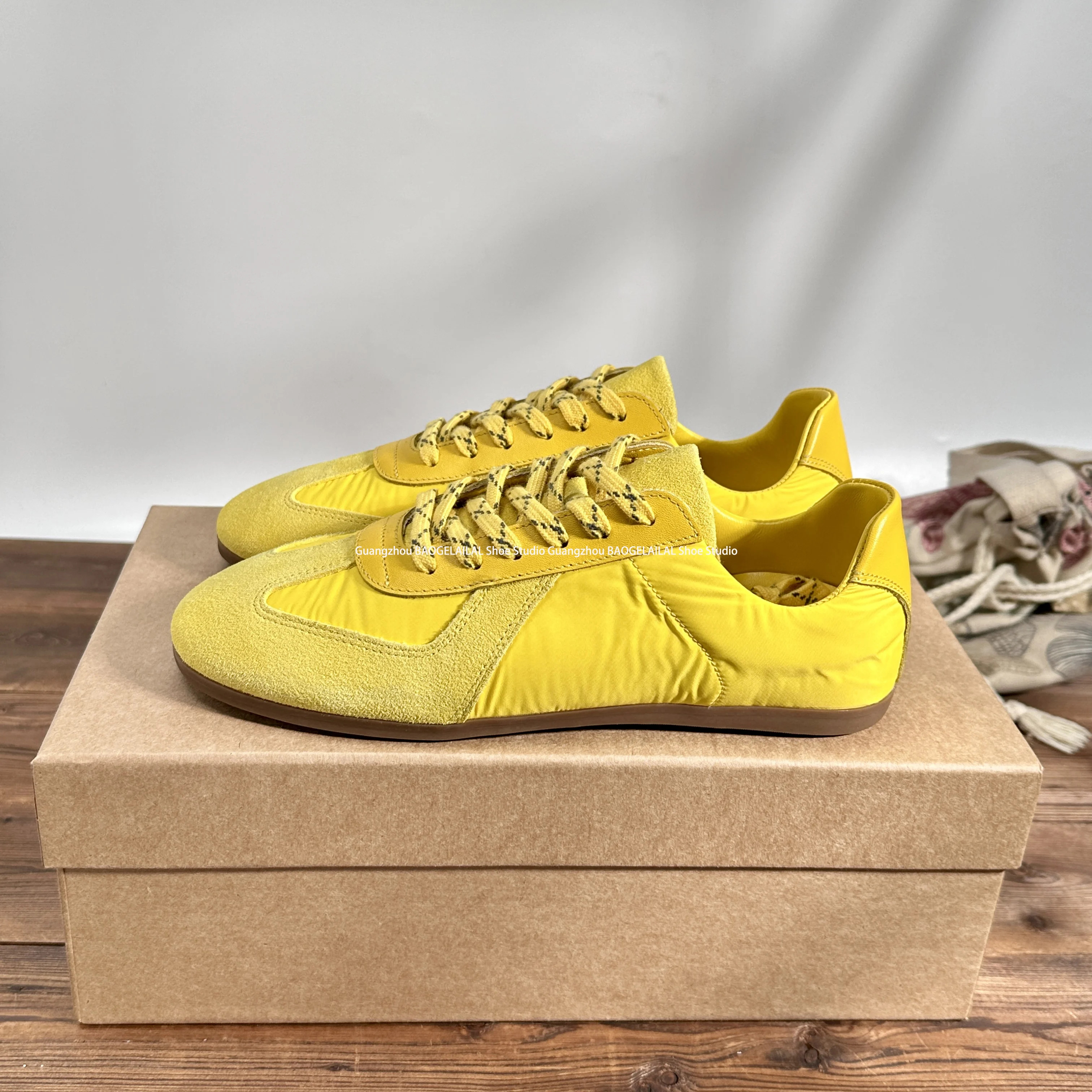 

2026 Spring New Leather Flat Bottom Color blocked German Training Shoes Women's Round Head Lace Casual Sports Shoes Yellow