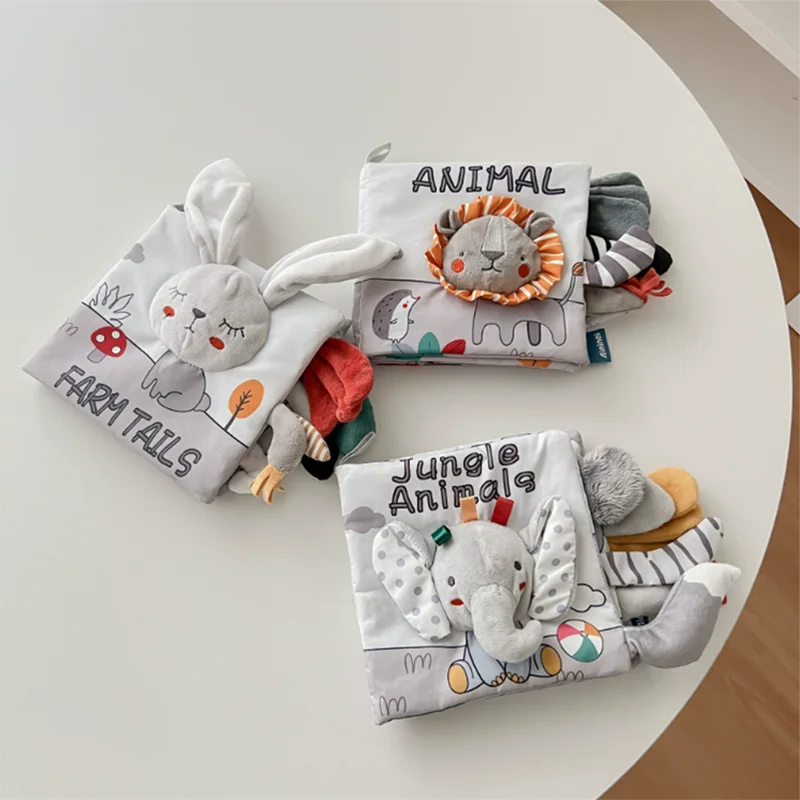 Giocattolo di puzzle cognitivo tridimensionale per la prima educazione del bambino del libro di stoffa della coda bianca grigia visiva del fumetto