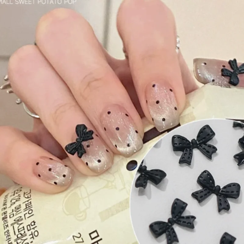 新しいリボンボウネイルアートアクセサリー、ブラックドットバタフライボウ、コンボウタイネイルチャーム、フラットバックレジンネイルラインストーンデコレーション