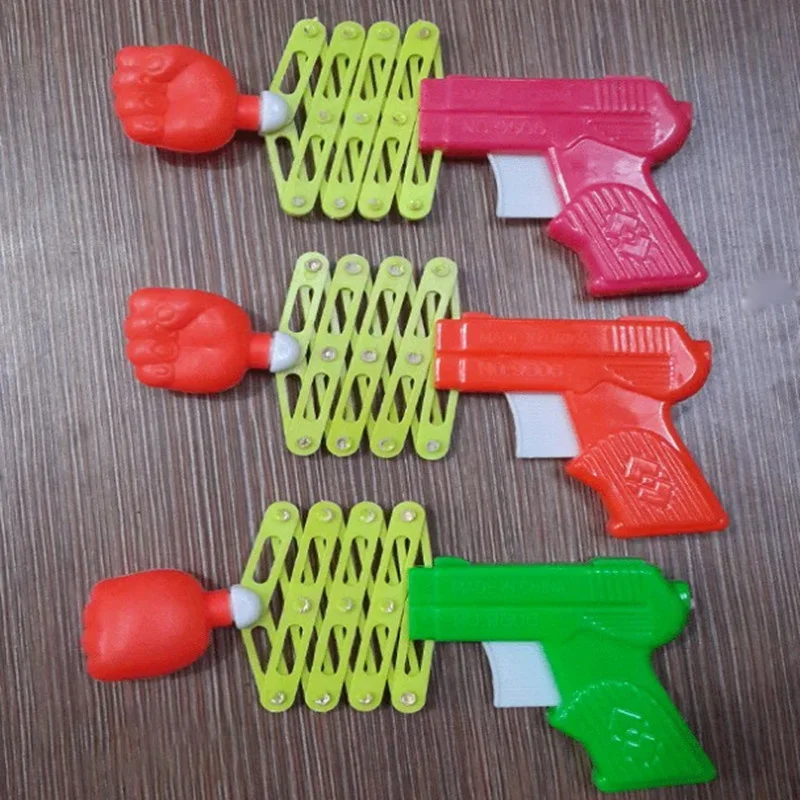 Speelgoed Vuistgeweer Kinderplezier Nieuwigheid Klaslokaal Onderwijs Grappig Vingerlezen Rekwisieten Nostalgische jeugdherinneringen Klassiek speelgoed