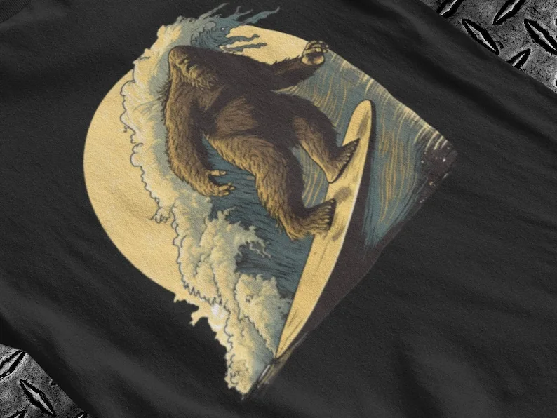 Surfing Bigfoot T-Shirt Sasquatch Tee Beach Ocean Shirt Great Gift for Surfers Lovers or Cryptid Wave S