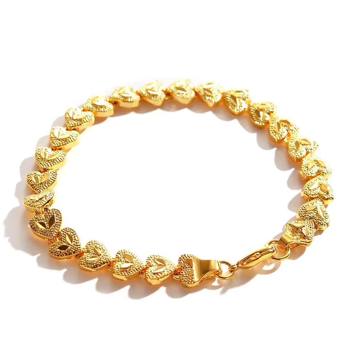 Women's 18K gold heart-shaped bracelet with complimentary shipping