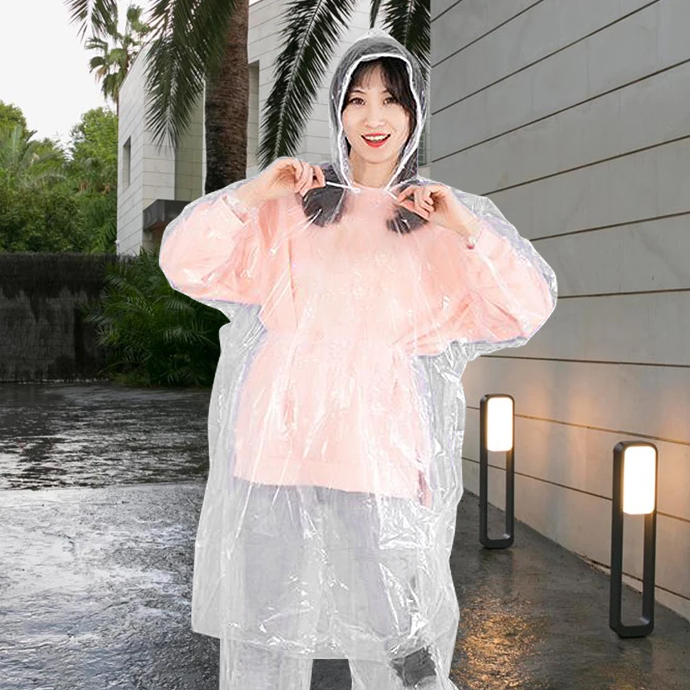 

Одноразовый плащ для кемпинга и путешествий, утолщенные водонепроницаемые дождевые штаны с уплотнением для ног, удобный прочный дождевик с капюшоном