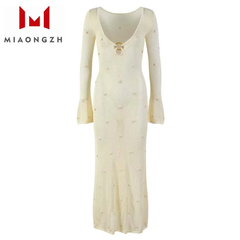 

Solid Color Hollow Out Knitted Dress Sexy Perspective For Women V Neck Long Sleeve Elegant Party Dresses 2025 Summer New Clothes