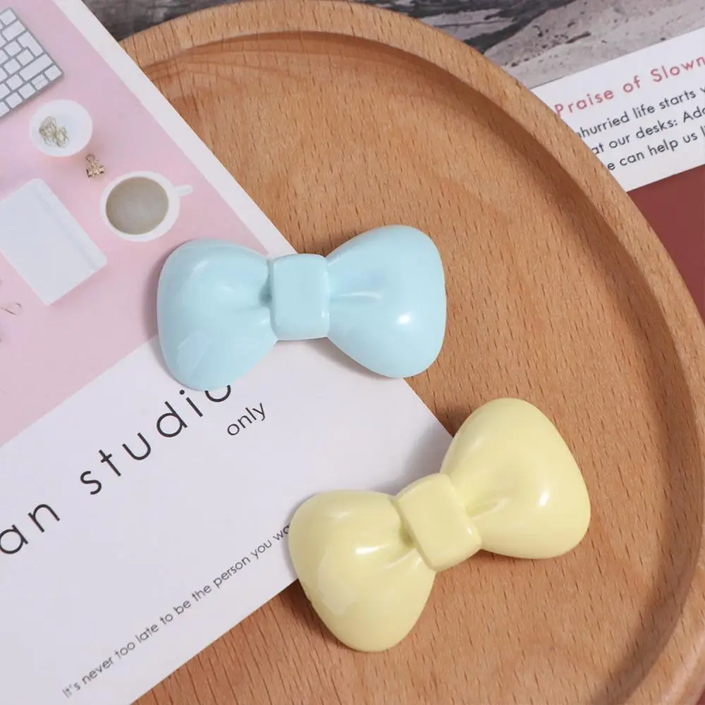 Рисунок 4 - Милая заколка для волос с бантом ярких цветов