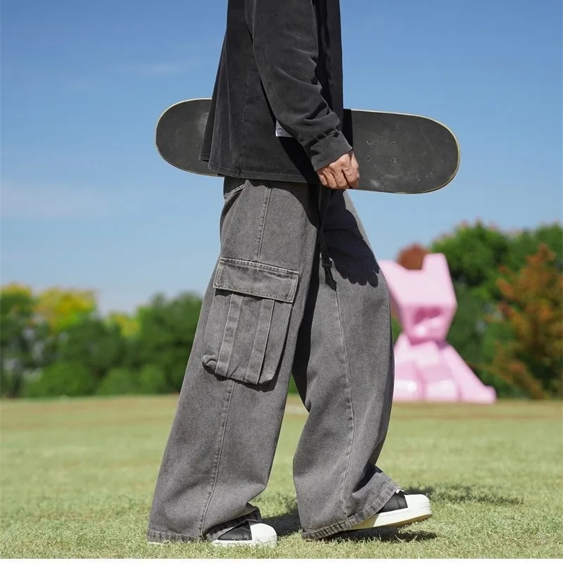 Solidne dżinsy w stylu Harajuku Hip-hopowe w stylu Vintage pantalon duże kieszenie homme szerokie nogawki workowate dżinsy mężczyzn Streetwear