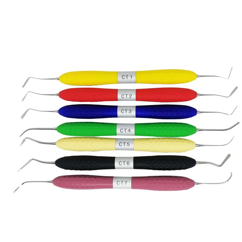 

7Pcs Dental Composite Resin Filling Spatulas Titanium Plated Head Filler Set Plastic Handle Restoration Kit Dental Lab Tools