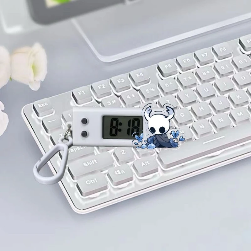 สินค้าอนิเมะการ์ตูน Hollow Knight ใหม่ นาฬิกาอิเล็กทรอนิกส์เงียบ ทันสมัยและสร้างสรรค์สำหรับนักเรียน นาฬิกาอิเล็กทรอนิกส์แบบติดกระเป๋า