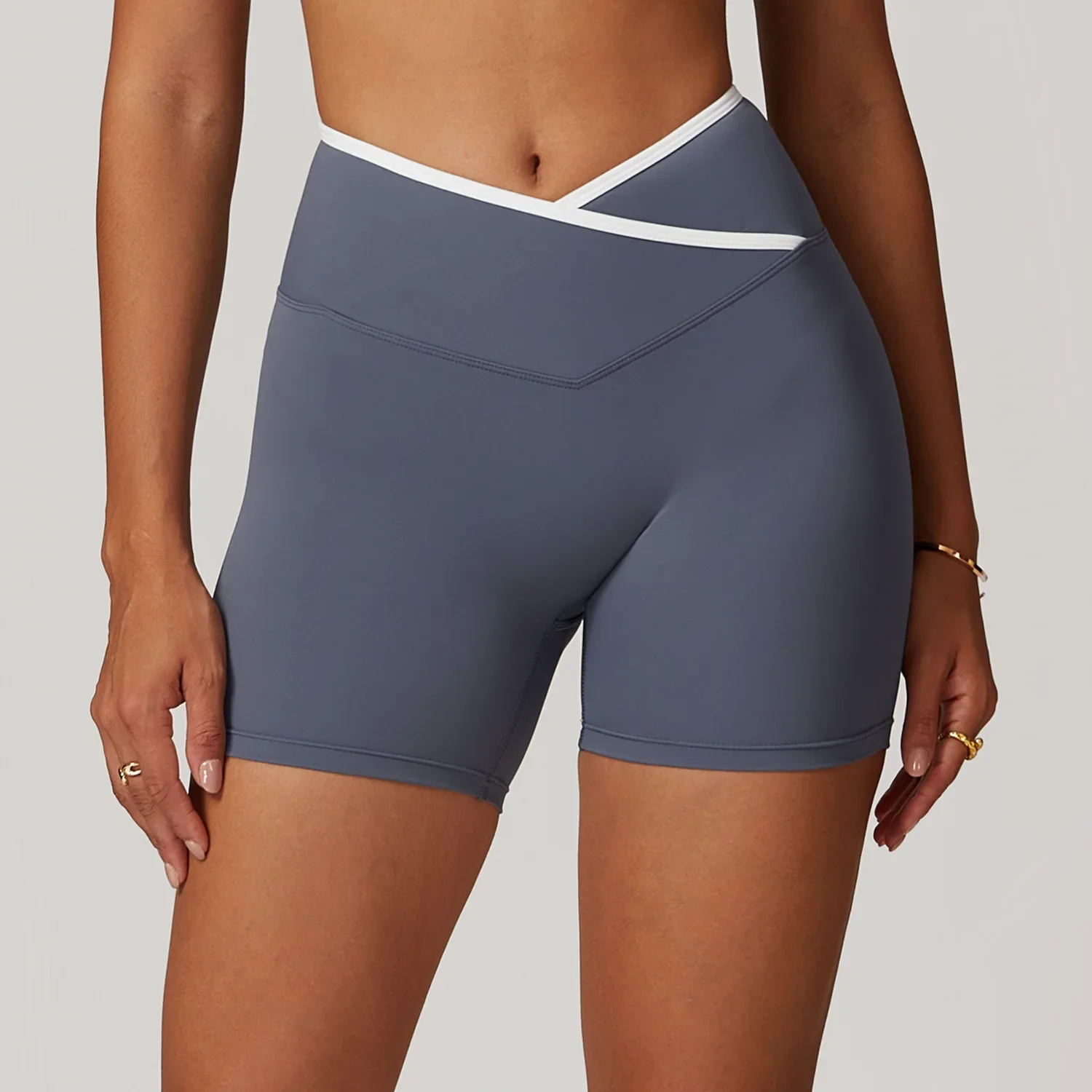 Pantaloncini da yoga da donna Pantaloncini da allenamento a vita alta Pantaloncini da fitness per il sollevamento del sedere Nuovi collant in vita a forma di V Leggings da palestra Pantaloni corti da corsa