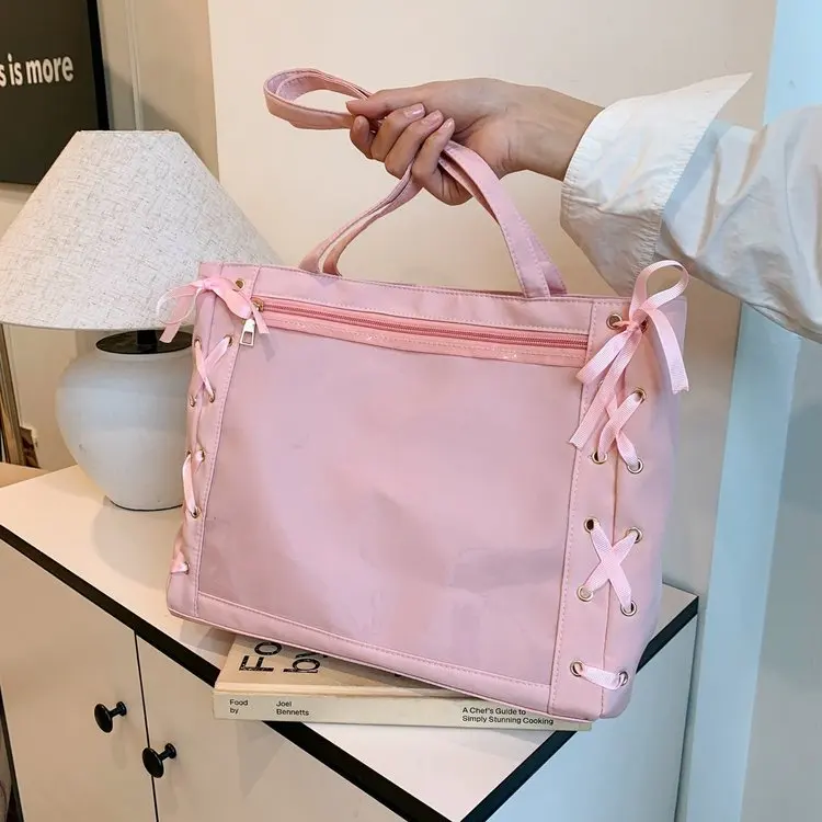 2025 New Japanese Style Ribbon Pain Bag Student Simple Large Capacity Commuter Forest System Book Bag Trendy Girl Bag Grain Bag